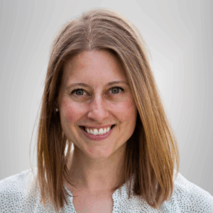 photo of a woman with shoulder-length dark blond hair