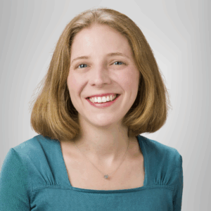 photo of a woman with short reddish blond hair